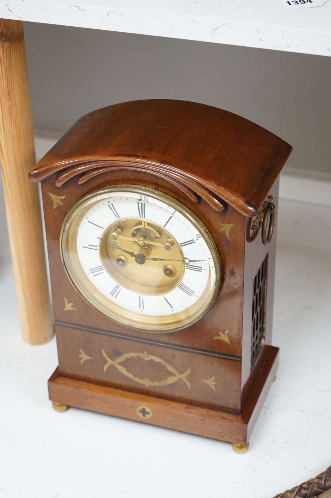 A 19th century brass inlaid mahogany mantel clock, 35cm high